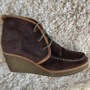 Olukai brand 2.5 in wedge heel, suede boots. These are in new condition.